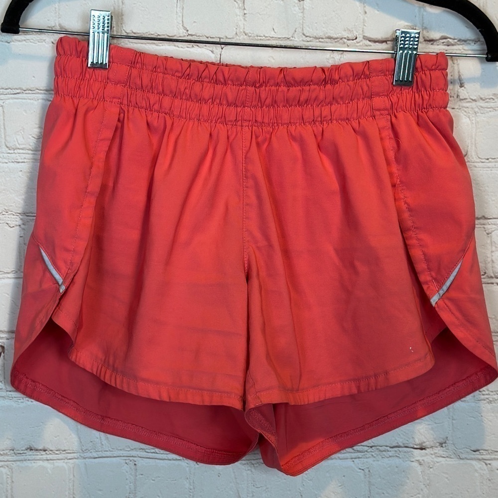 Athleta Womens Size XS pink elastic Waist pull on Racer Run Shorts 4"